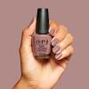 image:imageOPI Nail Lacquer Nail Polish  Crme Shimmer and Glitter Chip Resistant NailPolish  Fast Drying Streak Free Formula  The New OPIcons Collection  Spring 2026You Dont Know Suzi  Opaque Dark Cool GreyBrown Crme