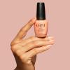 image:imageOPI Nail Lacquer Nail Polish  Crme Shimmer and Glitter Chip Resistant NailPolish  Fast Drying Streak Free Formula  The New OPIcons Collection  Spring 2026Queens Rule  SemiSheer Warm Salmon Coral with Shimmer
