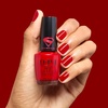 image:imageOPI Nail Lacquer Nail Polish  Crme Shimmer and Glitter Chip Resistant NailPolish  Fast Drying Streak Free Formula  Supergirl Limited Edition CollectionCape it Real  Opaque Bright Warm Red Orange Crme