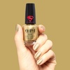 image:imageOPI Nail Lacquer Nail Polish  Crme Shimmer and Glitter Chip Resistant NailPolish  Fast Drying Streak Free Formula  Supergirl Limited Edition CollectionRevenge is Chic  Opaque Bold Warm Gold Metallic